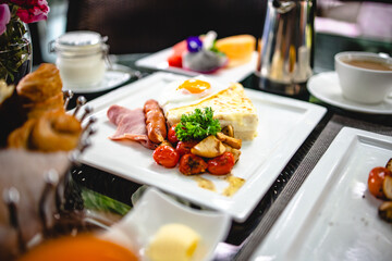 Full American Breakfast Huge healthy breakfast spread on a table with coffee Breakfast served with coffee English breakfast fried egg