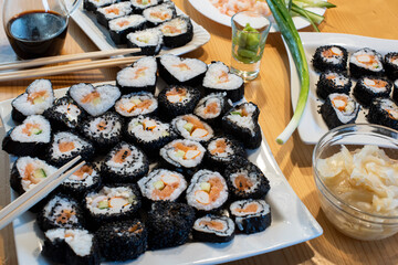 plates of homemade sushi on the table