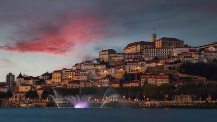 Evening panorama of the university and the historic city center of Coimbra.