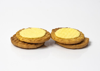 Delicious wheat circle cheese biscuits isolated on white background