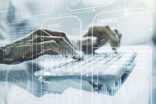 Abstract creative analytics data spreadsheet with hands typing on laptop on background, analytics and analysis concept. Multiexposure