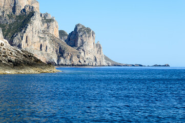 Naklejka premium The rocky coast of the little island of Marettimo a preserved maritime area near Sicily in the Mediterranean sea