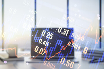 Abstract creative financial graph on modern laptop background, financial and trading concept. Multiexposure