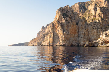 Fototapeta na wymiar The rocky coast of the little island of Marettimo a preserved maritime area near Sicily in the Mediterranean sea