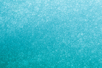 foam blue texture soap bubbles on the water abstract background
