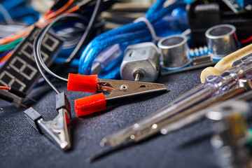 Fototapeta premium electronic board and tools repairs on black background