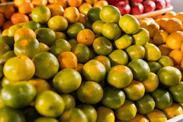 Heap of Green ripe abkhazian mandarins at market