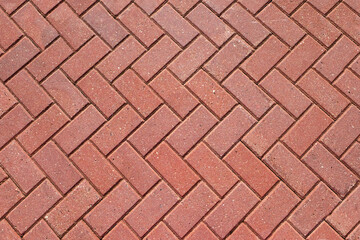 Abstract background from paving red tiles, bricks. Top view of the pavement pattern. Concept for...