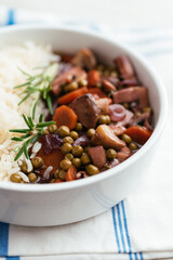 Home made mushroom Bourgogne with peas and carrots on rice