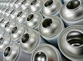 Aerosol cans in factory close up