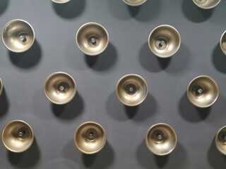 small bulbs in round iron shades