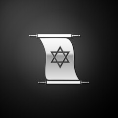 Silver Torah scroll icon isolated on black background. Jewish Torah in expanded form. Torah Book. Star of David symbol. Simple old parchment scroll. Long shadow style. Vector.