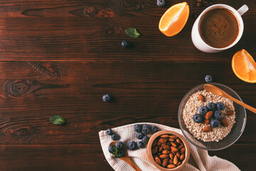 Healthy breakfast oatmeal with blueberries and almonds