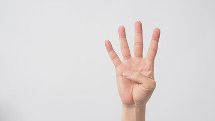 A hand sign of 4 fingers point upward meaning four.It put on white background
