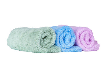 Different multicolor fluffy fabric towel isolated on the white