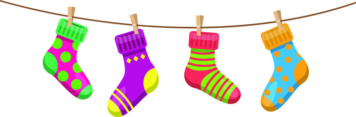 bright multicolored socks with clothespins hang on a clothesline