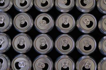 Aluminum cans. Opened cans of beer. Top view.