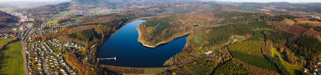 Breitenbach Dam aerial panorama view in spring time - Siegerland area, Germany.