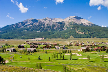 Skyland Golf Course - Small mountain resort town of Crested Butte in Gunnison County, Colorado in summer with Whetstone Mountain rising over the Skyland Residential Community and Golf Course