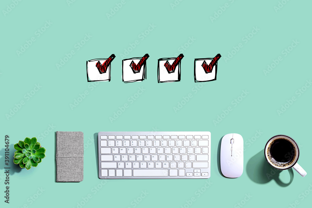 Poster checklist with a computer keyboard and a mouse