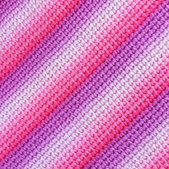 Knitted fabric pink and violet horizontal stripes. 