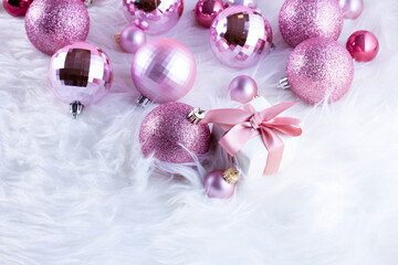 Christmas decorations on pink