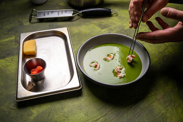 Chef cook fries noodles with shrimp and vegetables. Cooking food