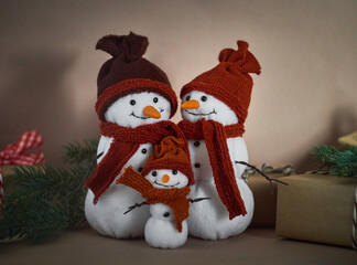 Christmas background with toy snowmans.