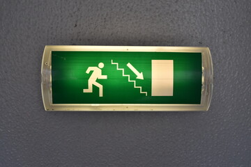 emergency exit sign on a wall