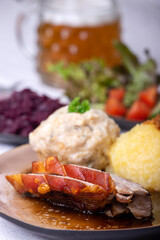 bavarian roasted pork with different dumplings