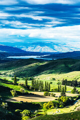 Naklejka na ściany i meble Green mountain valley in New Zealand