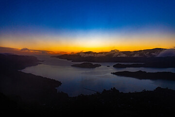 Fototapeta na wymiar Sunrise at a fjord in New Zealand