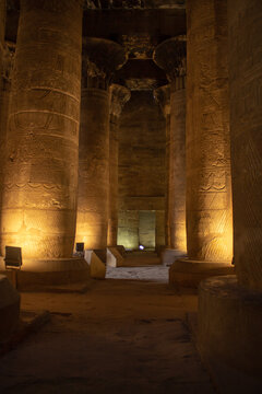 Columns of an egyptian temple at night