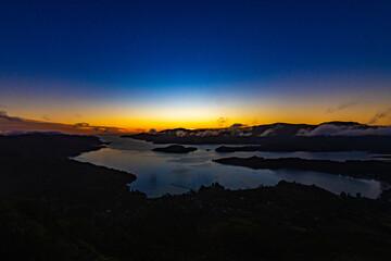 Sunrise at a fjord in New Zealand