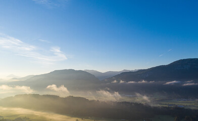 Obraz na płótnie Canvas Drone panorama over Tyrol landscape, at sunrise in Austria.