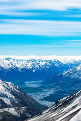 Snow covered mountains and green valleys in New Zealand