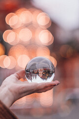 Lens ball with Christmas lights reflected