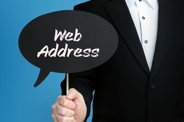Web Address. Businessman holds speech bubble in his hand. Handwritten Word/Text on sign.