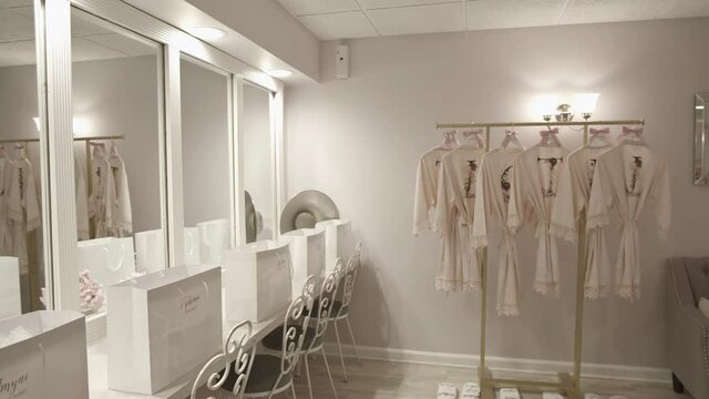 Bridesmaids robes and gifts in a bridal suite