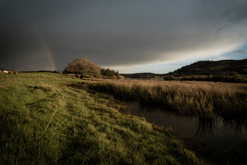 Flooded Lough Allua lake at sunset. southwest ireland. A lake lying on the river Lee which flows...