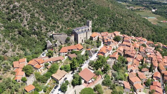 Panoramic view from above on the city Eus. Small town located on high mountain. Eastern Pyrenees. France. High quality 4k footage