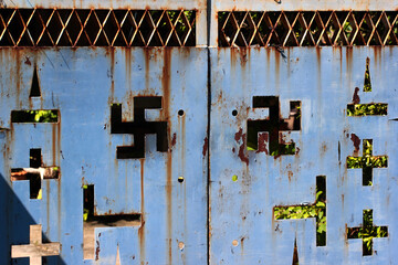 Buddhist symbols on a gates in Bangkok, Thailand