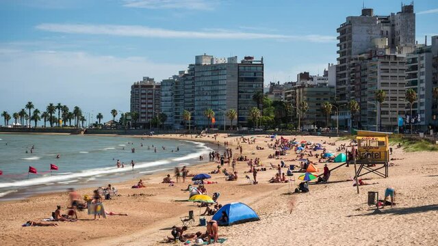 Timelapse view of people at the popular Pocitos Beach in Montevideo, the capital and largest city of Uruguay.