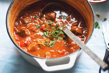 Beef goulash with paprika, tomatoes and parsley