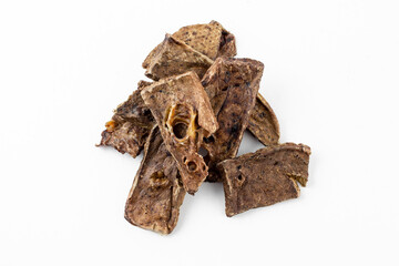 dried tendons of beef, lamb, pork, deer dog treats on white background