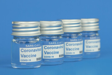 vials with the Covid-19 vaccine on a laboratory bench. to combat the coronavirus  sars-cov-2 pandemic 14