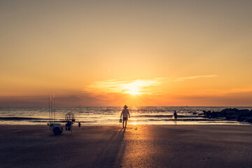 Fisherman Walking to the Ocean, Fishing at Sunrise