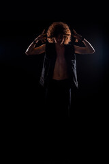 Young man with curly afro hiar