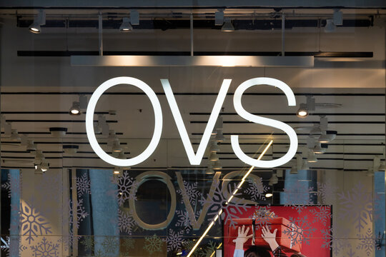 OVS logo and showcase of the store. OVS is largest clothing retailer in Italy, spread all accross the world. Bergamo, Italy - 29.12.2019