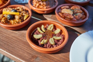 Tapas served at a restaurant with a variety of small plates